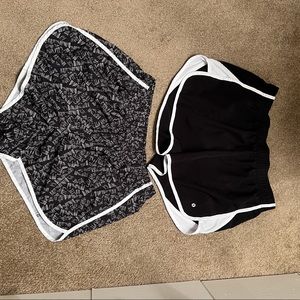 White & Black. 1 pair is regular $32. Running shorts.